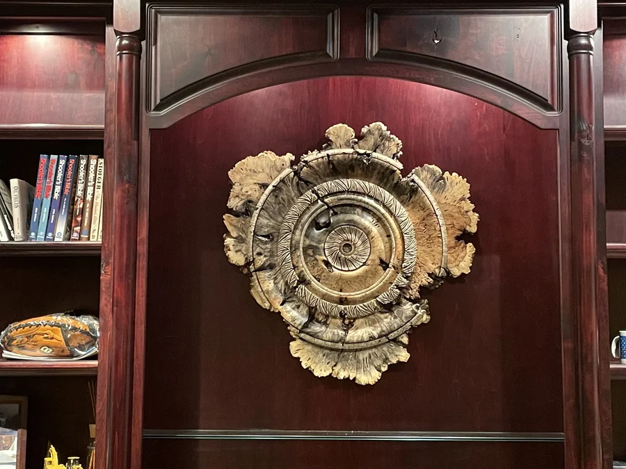 Wood sculpture installed in a study