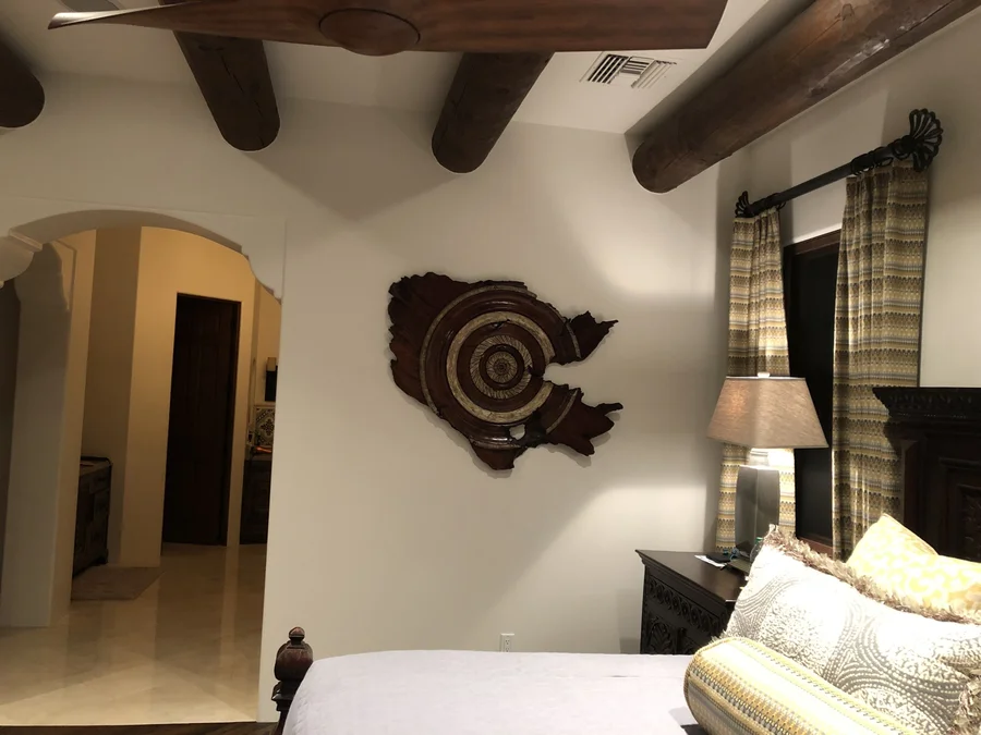 Wood sculpture installed in a bedroom