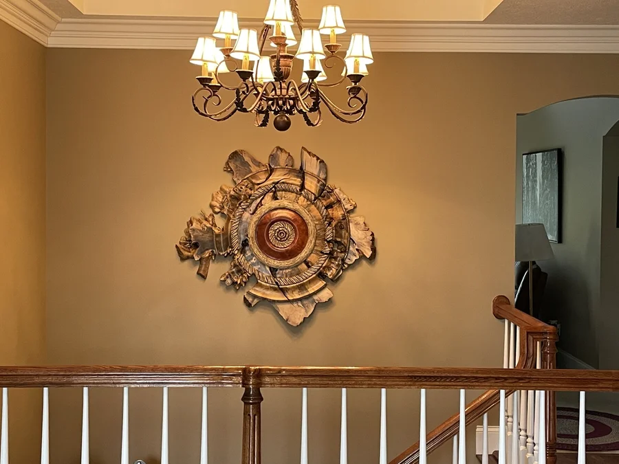 Wood sculpture installed in a stairway